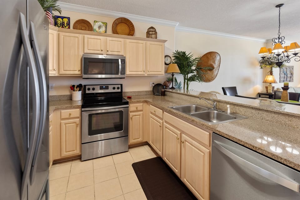 Your fully-equipped kitchen features granite countertops, stainless steel appliances, and plenty of space to prepare memorable vacation meals.