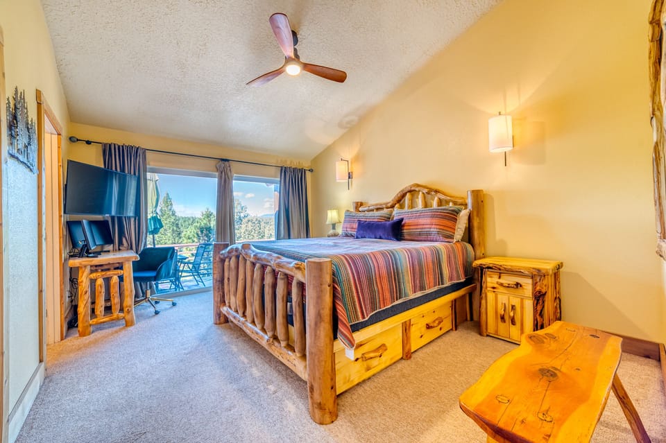 Master Bedroom with King Bed, dual monitor workstation, TV and great view!