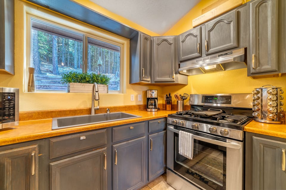 Very well-appointed kitchen with gas stove, oven, microwave & all the spices!   