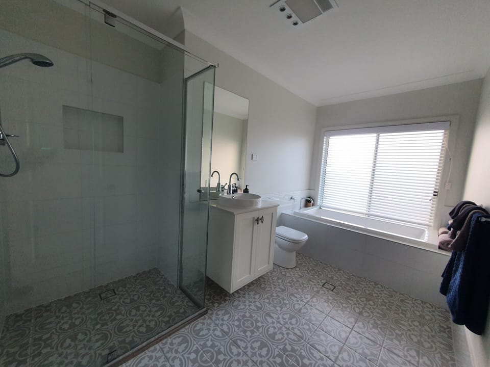 Bathroom with full size bath