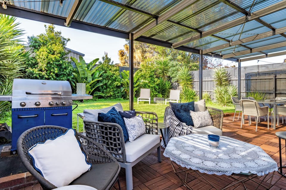 Al fresco covered area has  outdoor lounge, gas bbq dining table and 8 chairs.