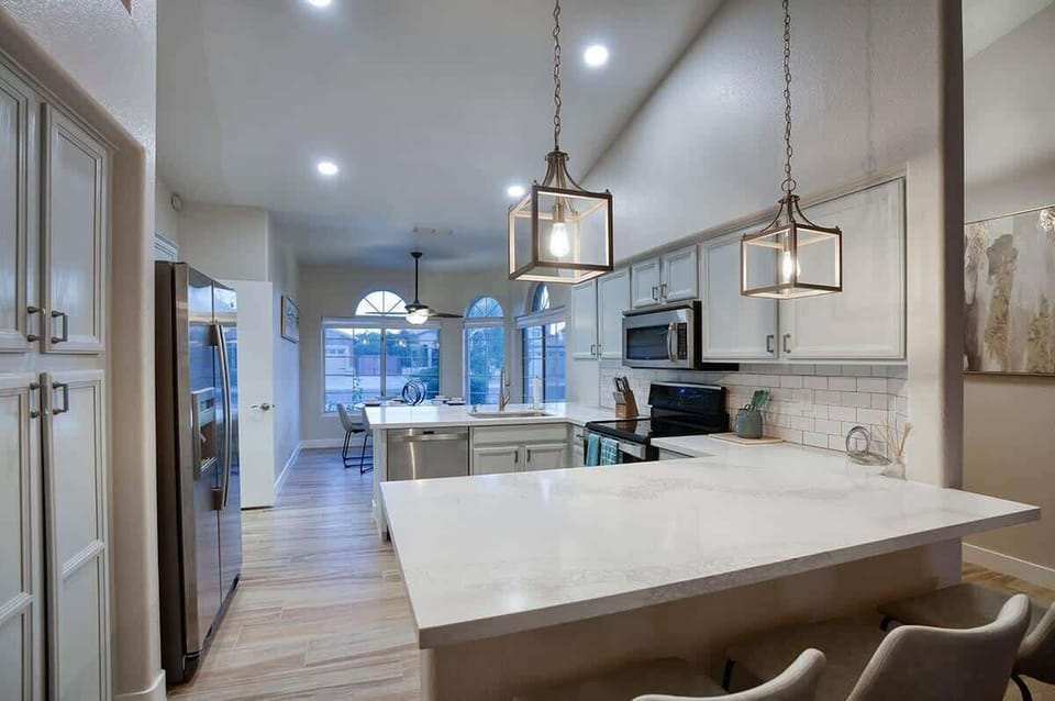 Fully remodeled kitchen with ample counter space and modern finishes.