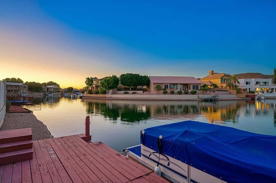 Experience stunning sunsets reflected on tranquil lake waters.