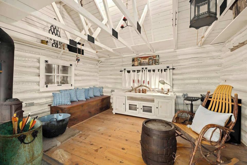 The inside of 'Standing room only' - an 1800s restored cabin available for use only upon request.