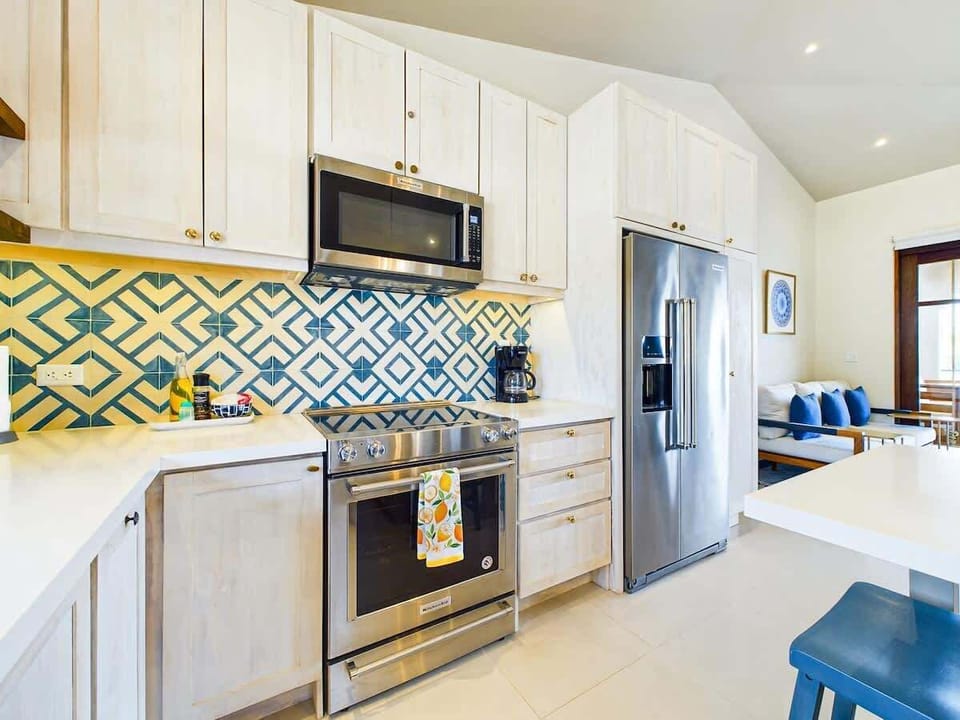 Open kitchen, stainless steel appliances