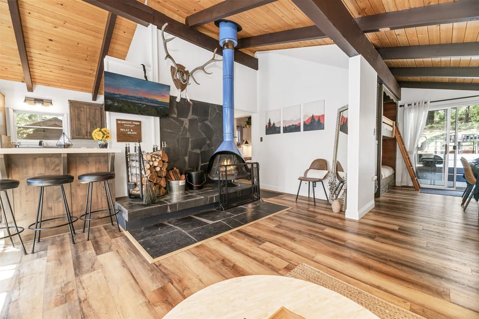 Enjoy the "ahead of its time" open concept cabin that is spacious, yet cozy. The Bunk Room/Dining Nook to the right offers a third bedroom area that not fully enclosed, yet still offers privacy.