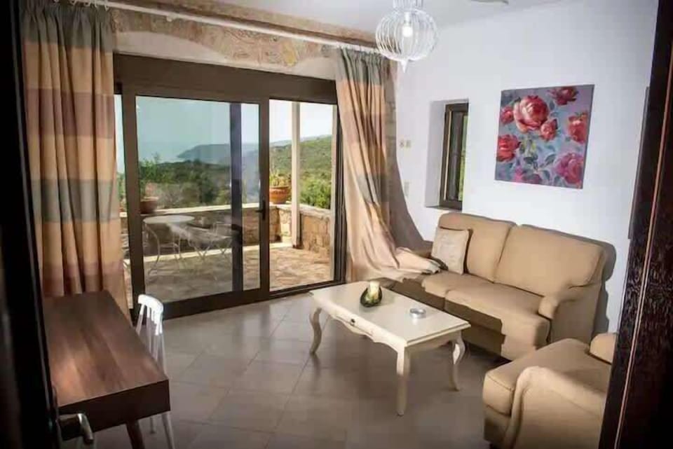 Master bedroom 2nd floor seating area with ocean view and private balcony. 