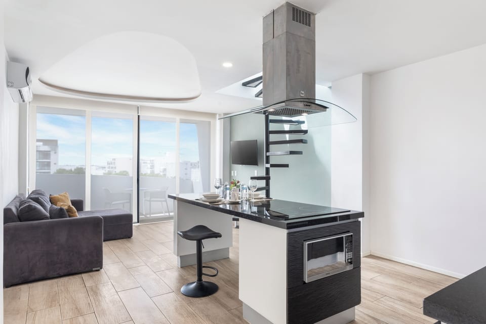 Penthouse | Living area | 38-inch Smart TV with digital channels