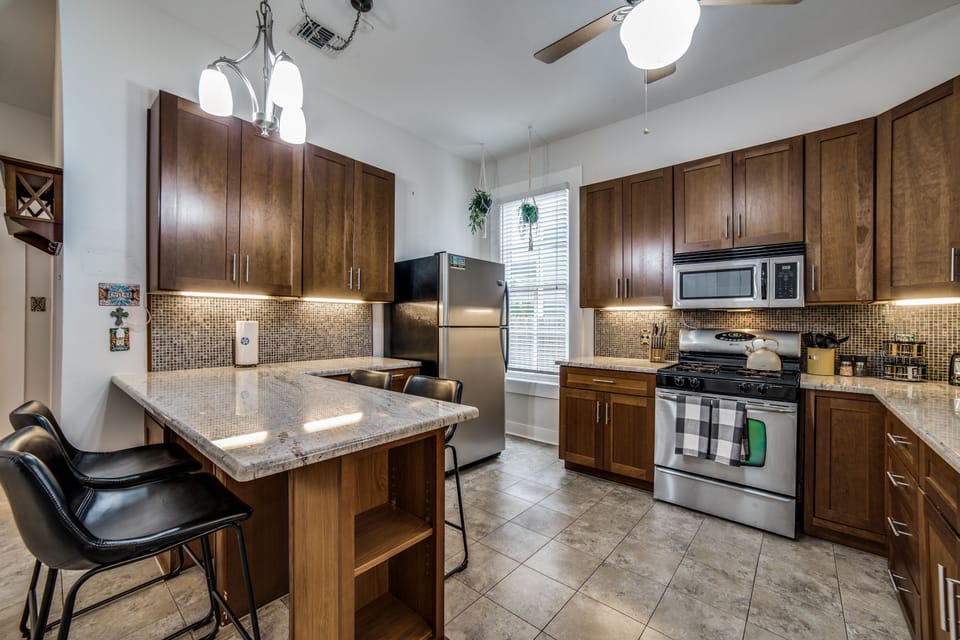 This kitchen is well appointed and has seating for 4 at the island.  Renovated in 2015, you'll enjoy all of the modern amenities you expect in your own kitchen, with a ton of old world charm from our 110 year old home!