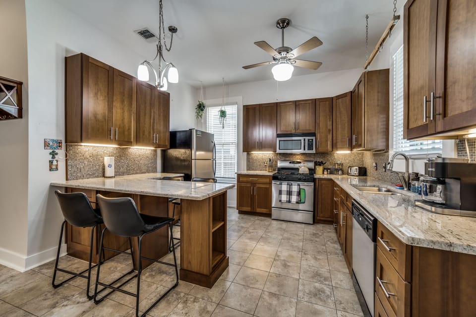 The home may be historic, but this kitchen is anything but that! Well-stocked with everything you need to whip up a meal!  Pots & pans, baking sheets, casserole dishes, crockpot, rice cooker and more! 