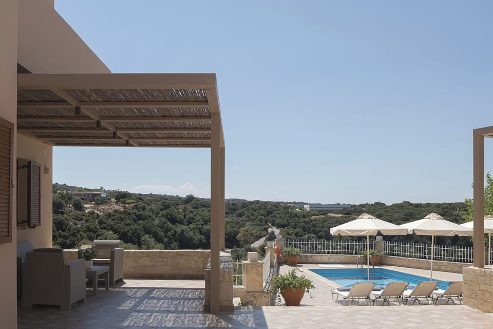 Slow Cretan living surrounded by nature, stonework, and rural views.
