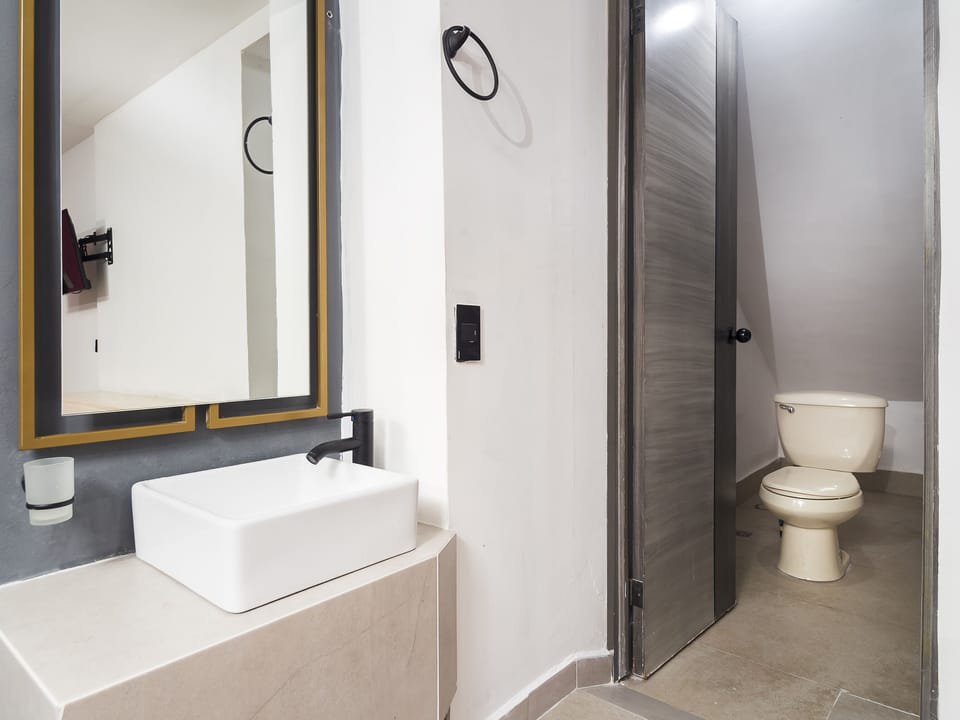 Economy Double Room, 2 Double Beds, No Windows | Bathroom | Shower, towels