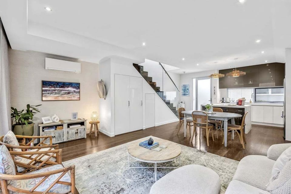 Cosy lounge area with a Smart TV and split system heating and cooling