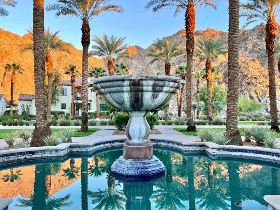 Welcome to Legacy Villas! An upscale, gated Resort Community directly adjacent to the famous La Quinta Resort with 12 pools and spas, clubhouse, gym, fragrant citrus trees, fountains and gorgeous Mountain Views, surrounded by Golf, Tennis & Shopping