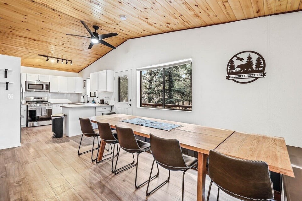 14 person dining table with custom built breakfast nook bench to enjoy meals