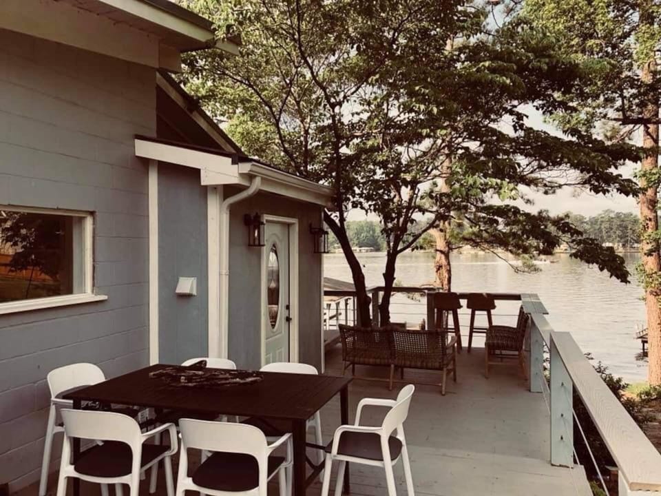Expansive outdoor deck  provides fresh cool breeze and lake views.