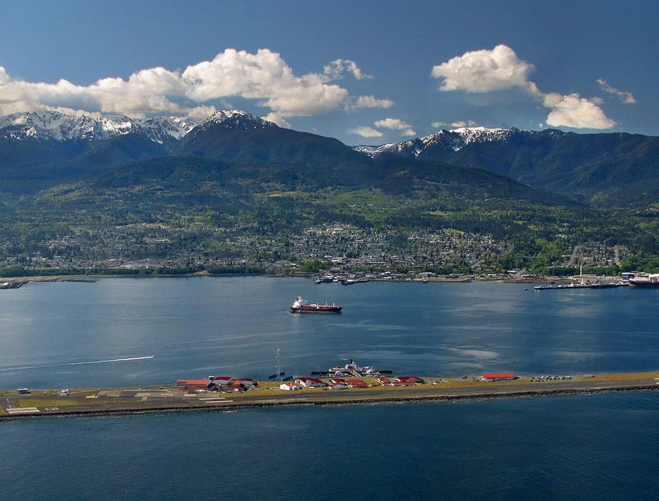 Port Angeles harbor and the Olympic mountains from the air.