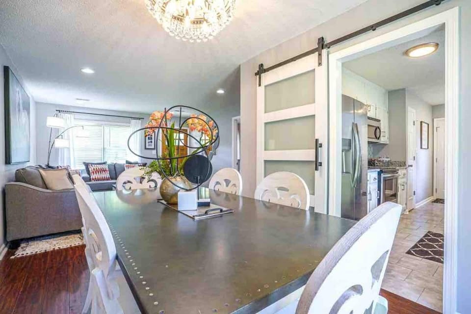 Dining Room table looks into kitchen.