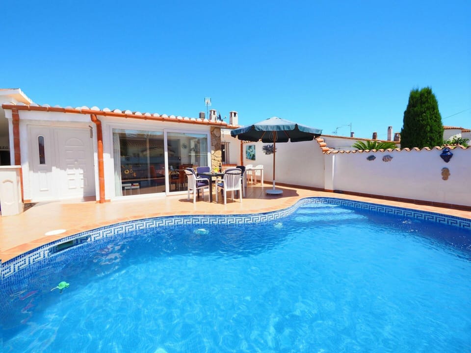 Water, Sky, Property, Plant, Swimming Pool, Building, Azure, Chair, Shade, Outdoor Furniture