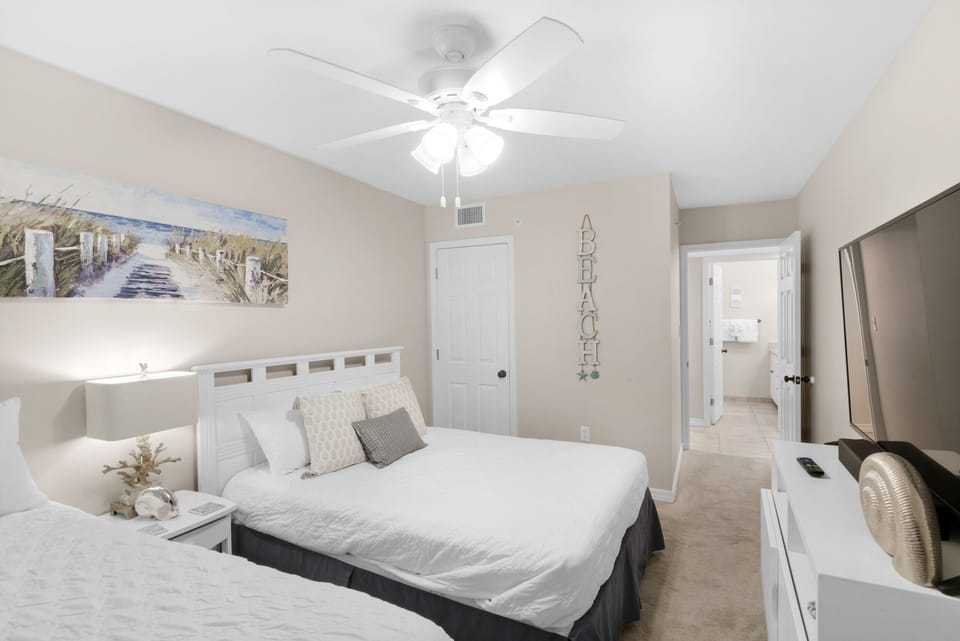 Guest bedroom with large flat screen TV