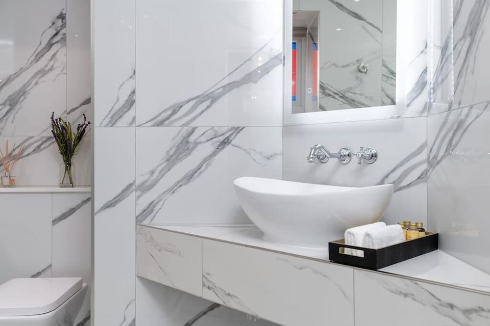 Porcelain tiled family shower room