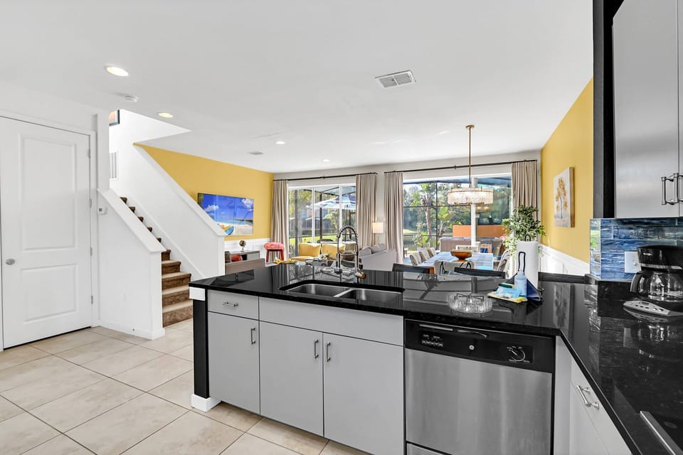Large open kitchen overlooking living areas and lanai