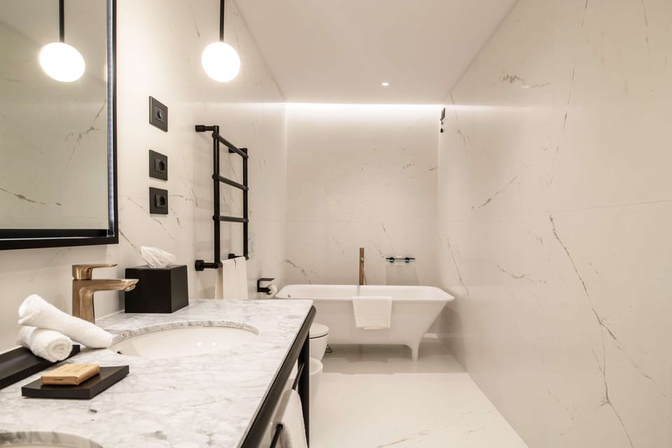 Apartment, 1 Bedroom | Bathroom | Hair dryer, bathrobes, slippers, bidet