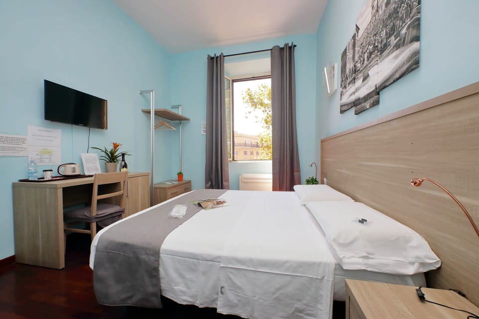 Standard Double Room (Guesthouse) | Minibar, in-room safe, individually decorated, individually furnished