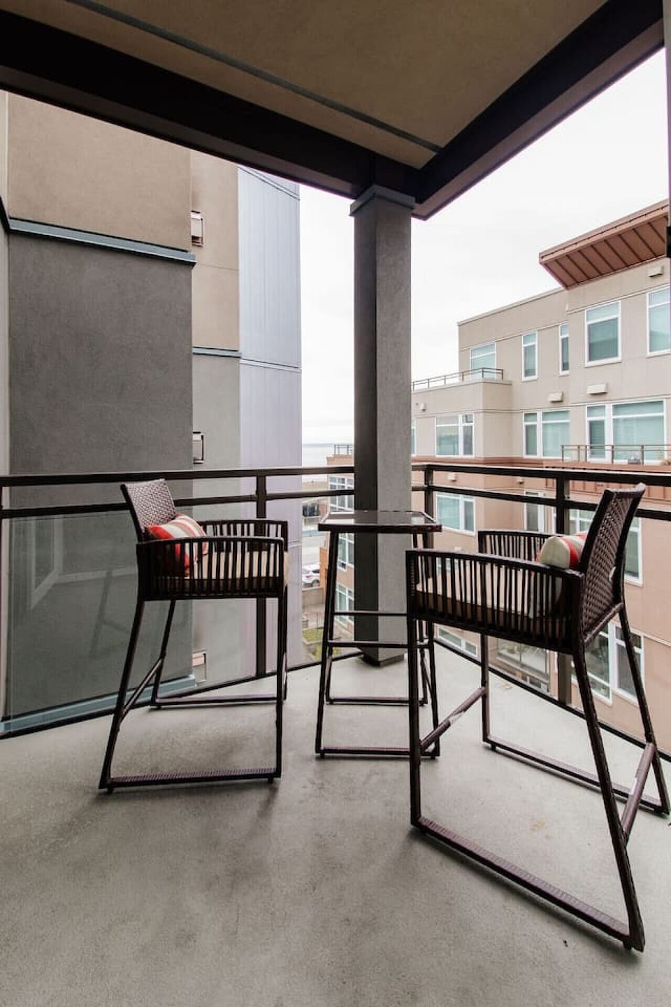 Patio facing courtyard and with water views