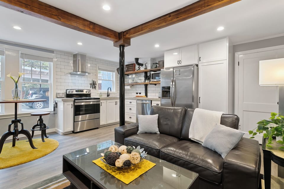 Open concept main room includes the kitchen, dining, and living room.