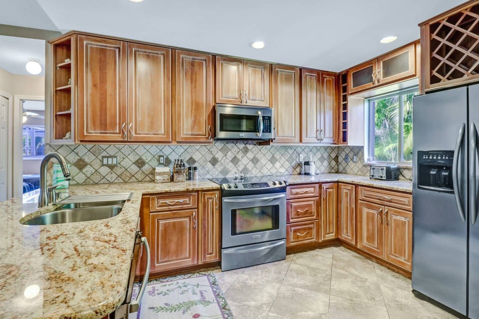 The kitchen comes well equipped with full size oven, dishwasher and refridgerator/freezer.