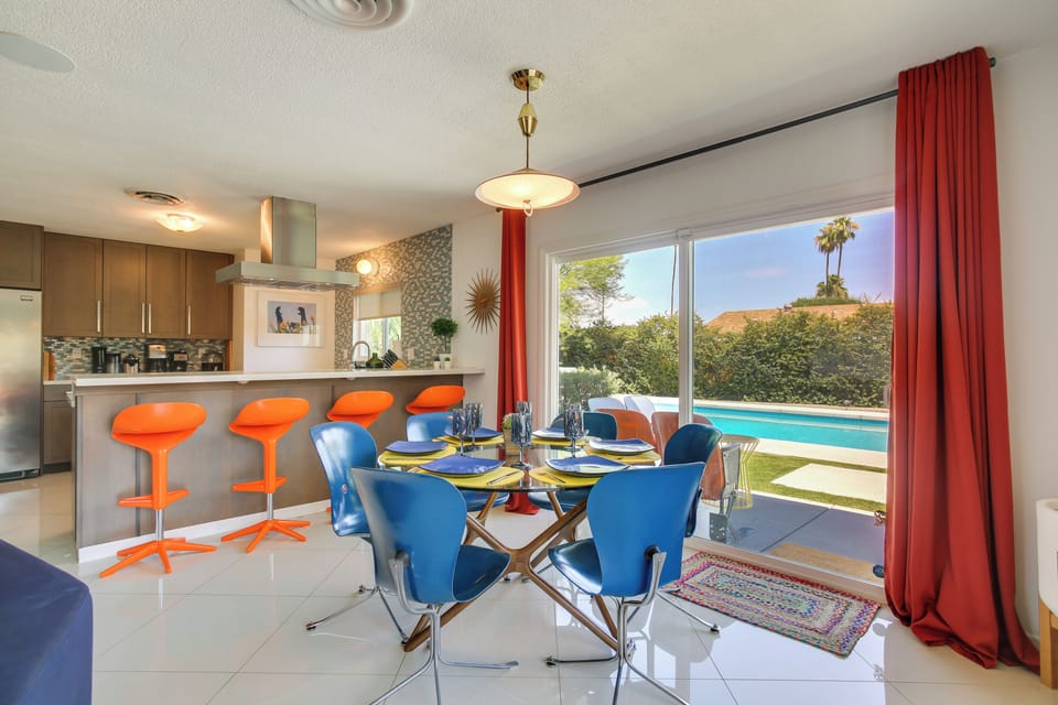 Dining Area | Breakfast Bar | Wood-Burning Fireplace | Mountain Views