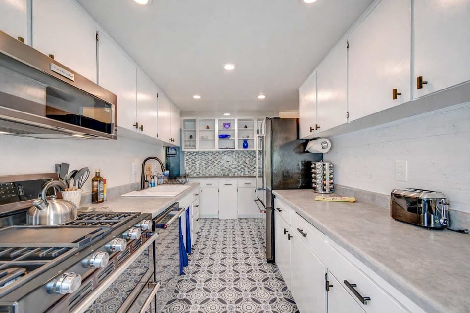 Modern kitchen with sleek countertops, stainless appliances, and a bright, stylish space for cooking and gathering.
