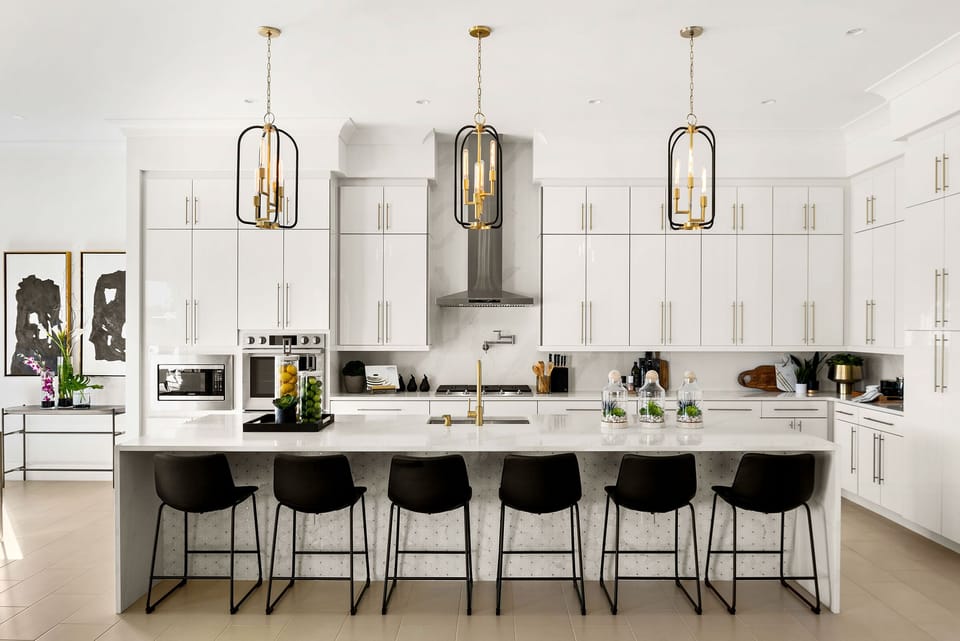 The kitchen breakfast bar has seating for 6