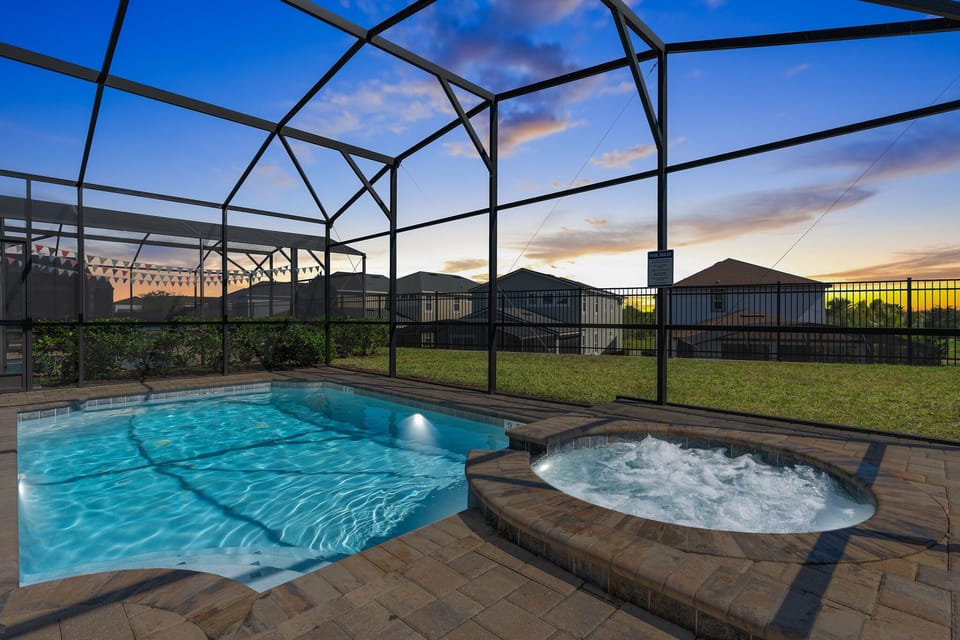 The covered lanai makes enjoying the sparkling pool a bug-free activity.
