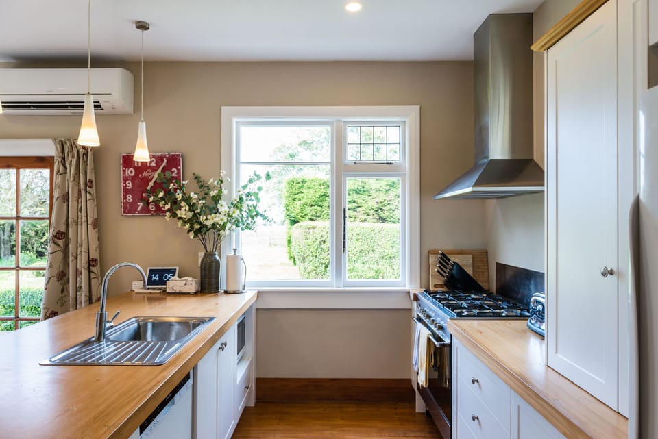 Kitchen with gas hob, electric oven microwave and other appliances