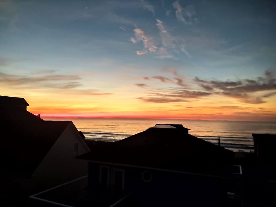 Sunrise over the ocean from the upper deck. What a way to start the day.