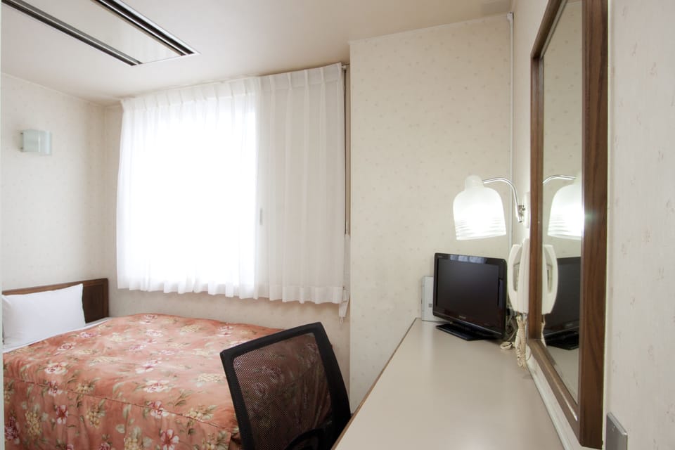 Desk, WiFi (free), bed sheets