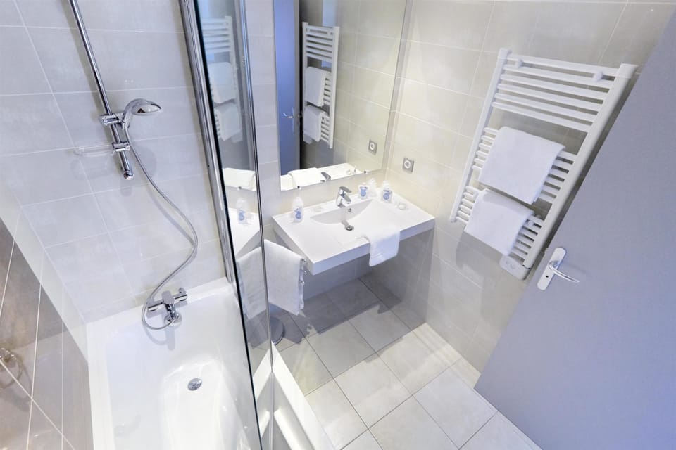 Eco-friendly toiletries, hair dryer, towels