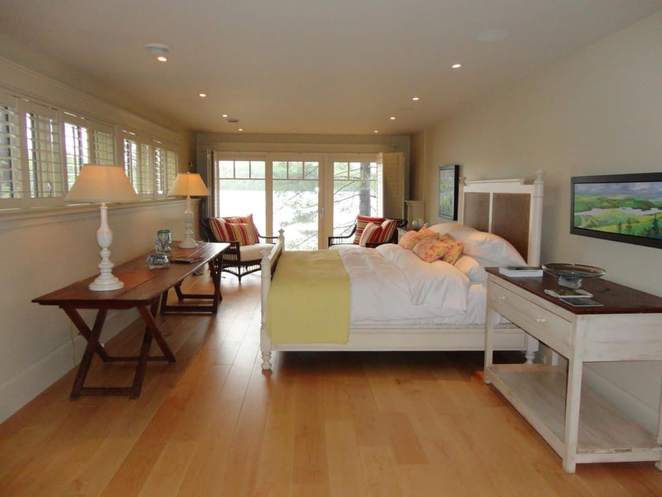Suite, 1 King Bed, Lake View | Iron/ironing board, free WiFi, bed sheets