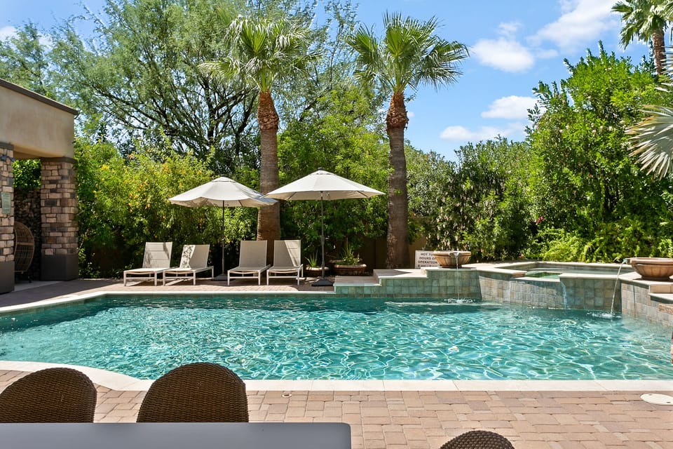 Enjoy the uxurious private pool and hot tub with spillway