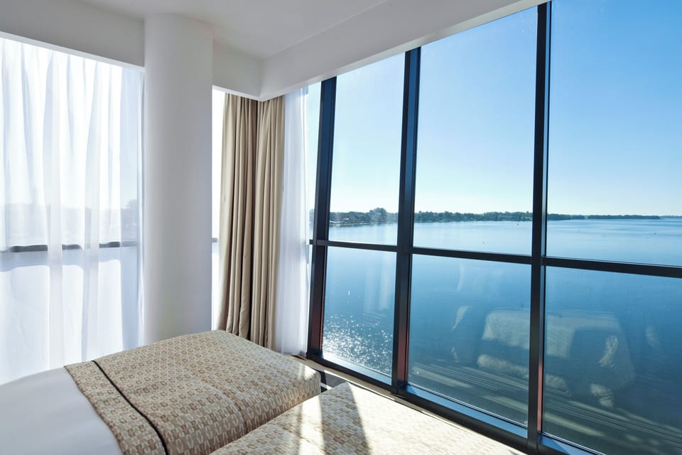 Classic Suite, Balcony, Lake View | Premium bedding, minibar, in-room safe, laptop workspace