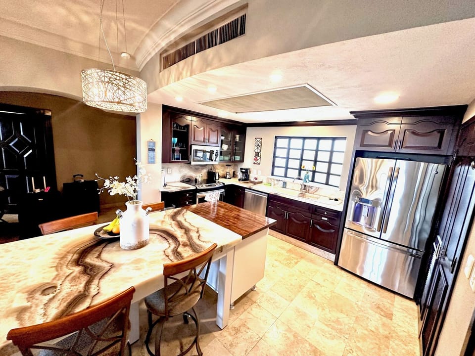 Small appliances include microwave, coffee maker, blender and toaster.