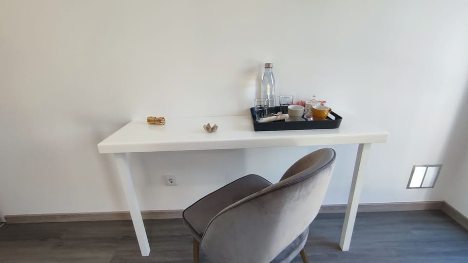 Premium bedding, memory foam beds, desk, laptop workspace