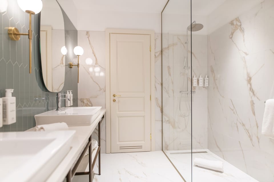 Rainfall showerhead, eco-friendly toiletries, hair dryer, bathrobes