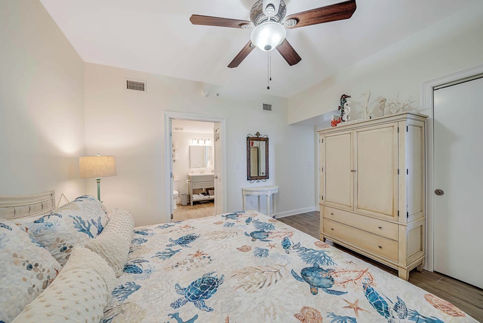 The second bedroom also features a King bed, television, and ensuite bathroom that can also be accessed through the hallway.