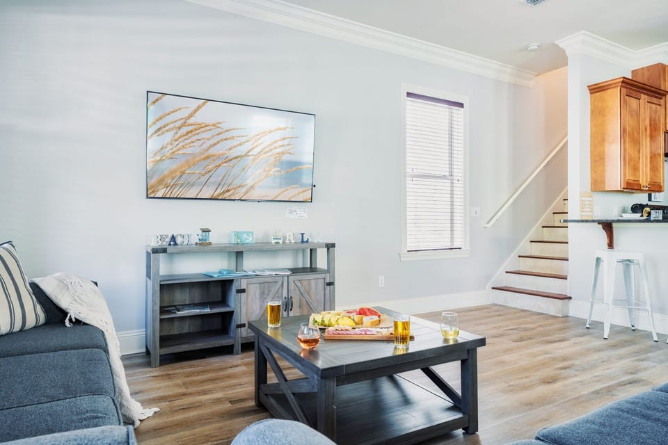 Living room with 65 in Smart TV.