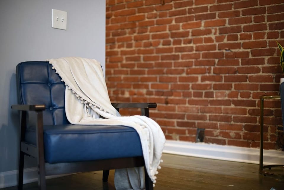 Exposed brick adds character to every corner.