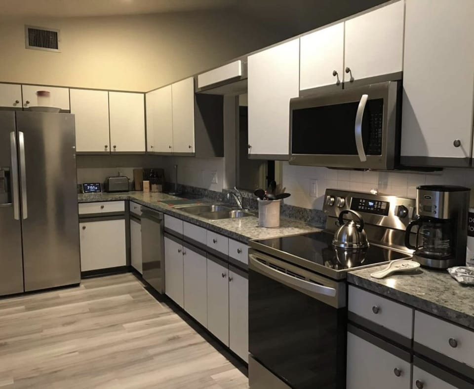 Spacious kitchen includes filtered water and icemaker in fridge door.