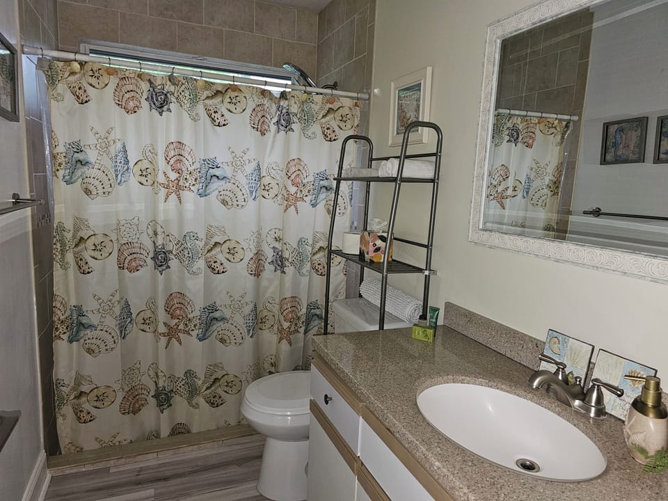 Second bathroom includes large shower, and semi-en suite to one of the bedrooms.